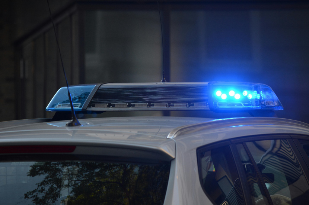 A blue light lit up on the top of a police cars