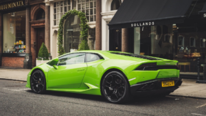 Green sports car on the road