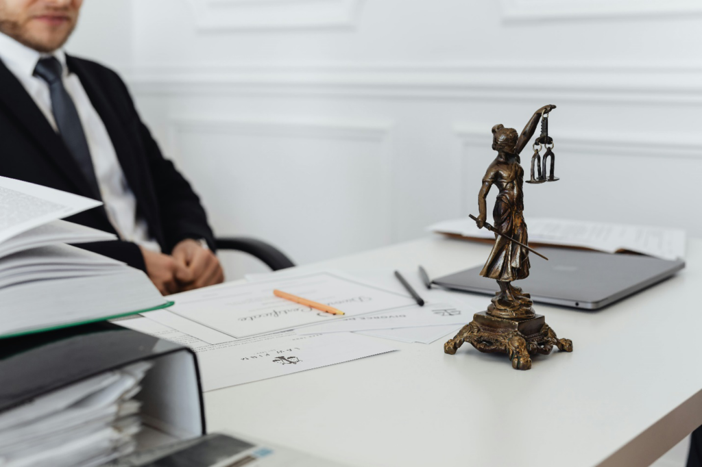 a lawyer sitting behind his desk