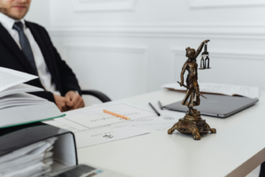 a lawyer sitting behind his desk
